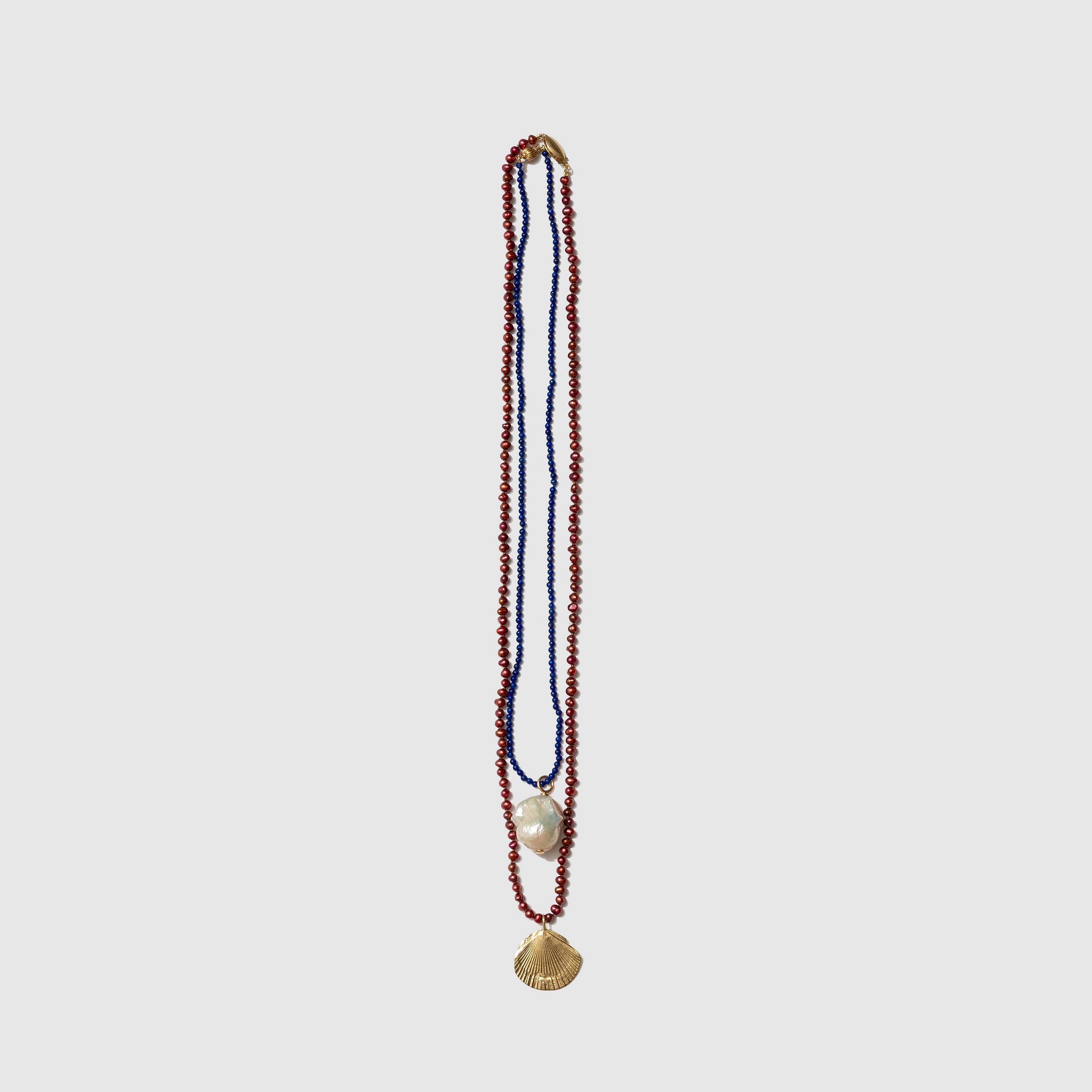 GOLD CONCHA PENDANT